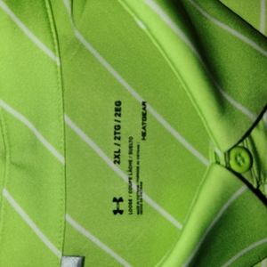 Under Armour loose fit heat gear golf shirt.